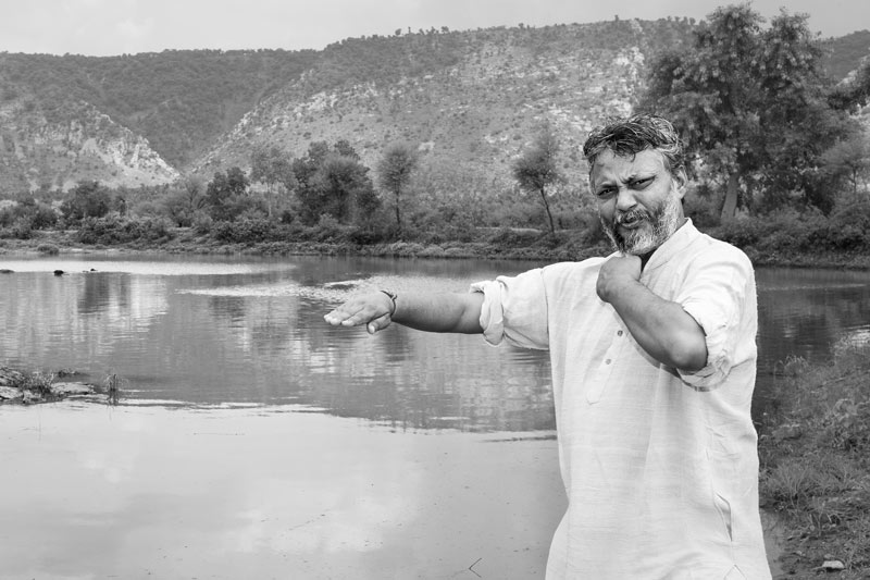 Rajendra Singh - The Water Man of India, explaining the design and principles of a 'johad'at Chountrawala Johad in Gopalpura village, district Alwar, Rajasthan